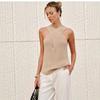 The New Women's Wear Is Elegant and Stylis Featuring A Sleevelessdrawstring Knitted Sweater and A Vest