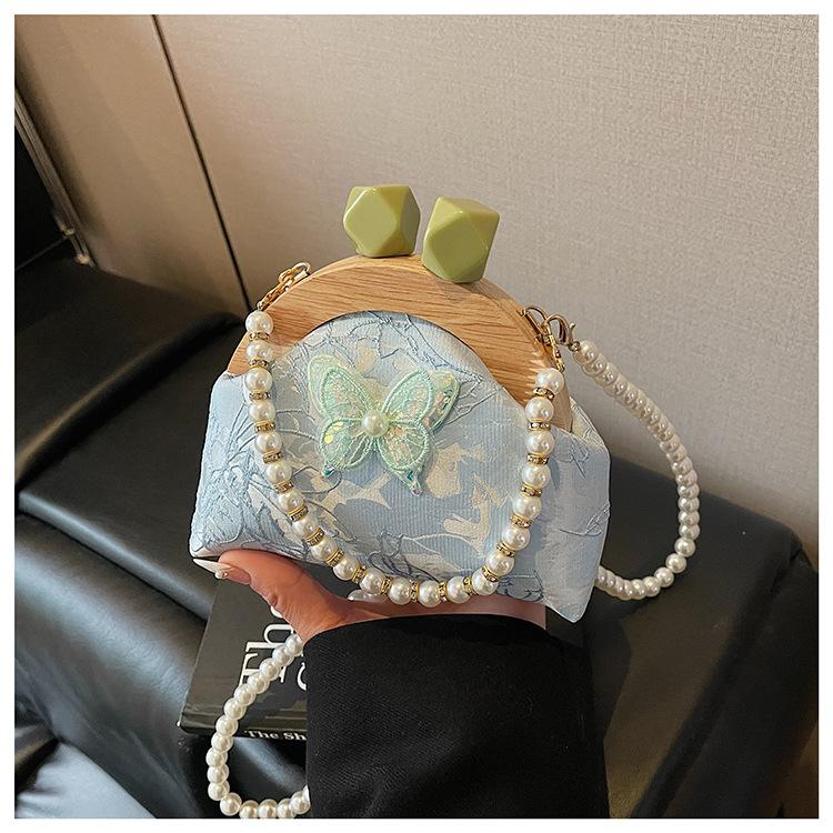 Summer embroidery small bag women's new fashion bamboo joint portable mouth gold bag pearl chain messenger bag