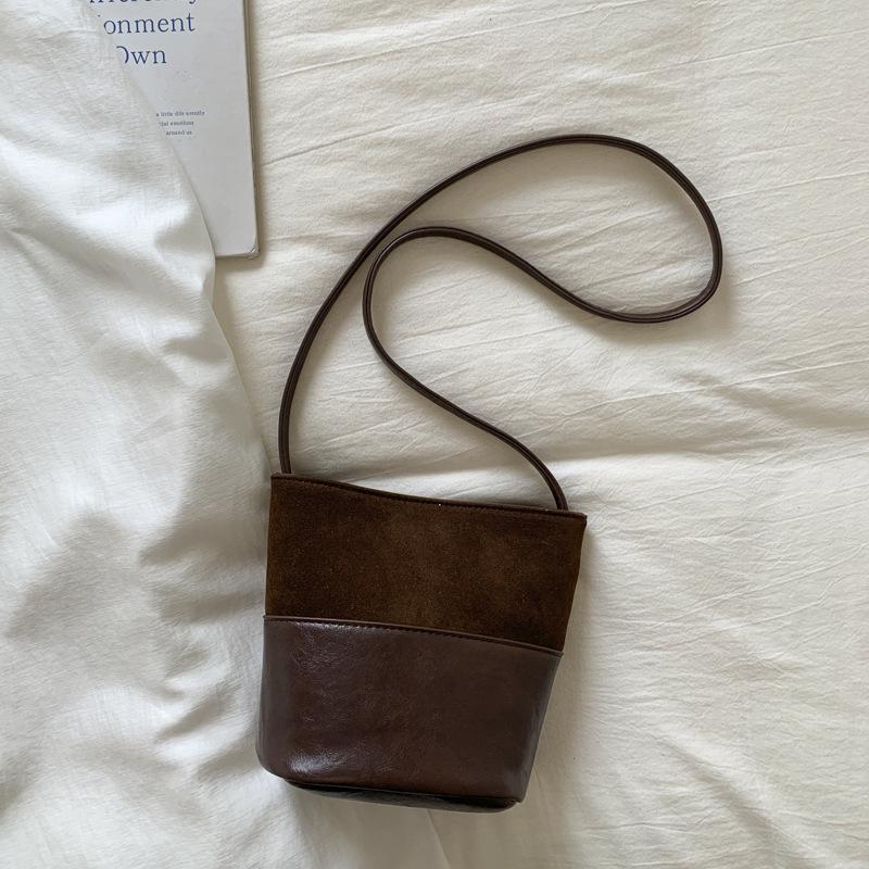 

Autumn Retro Suede Bucket Bag: Women s Fashionable Large Capacity Shoulder & Crossbody Bag.
