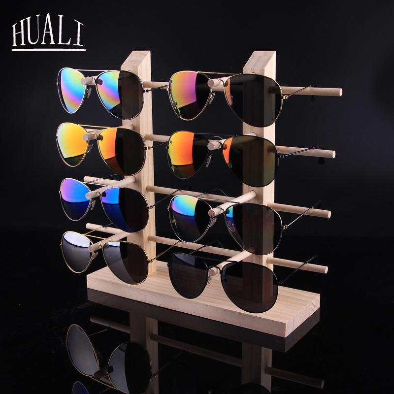 Stojak podłogowy z litego drewna na oprawki okularów i okulary przeciwsłoneczne