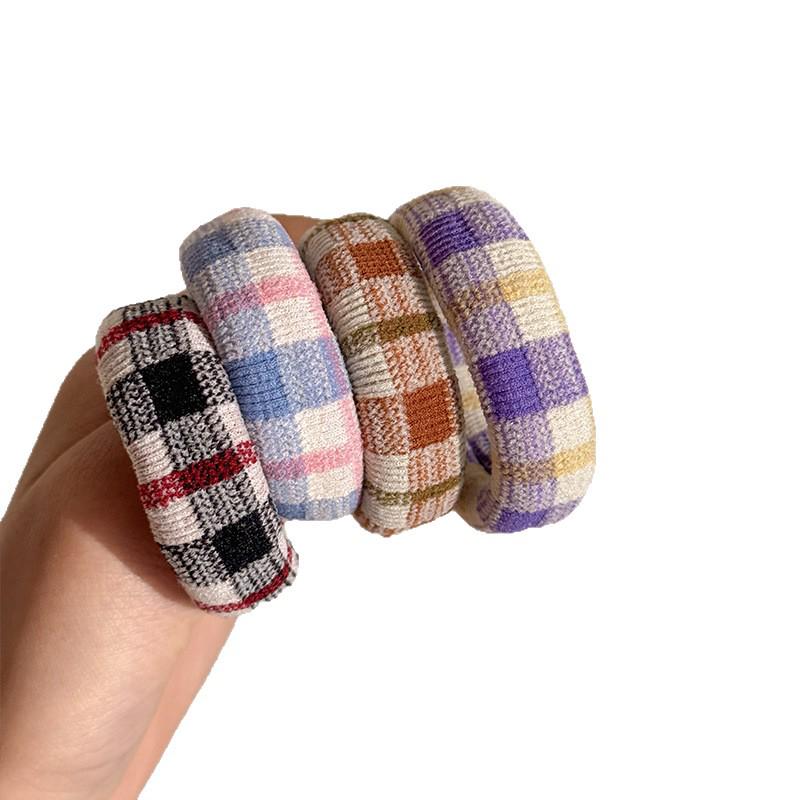 Korean Style Elastic Hair Ties: Durable, No-Damage, Leather Covered, Seamless Bands for Women.