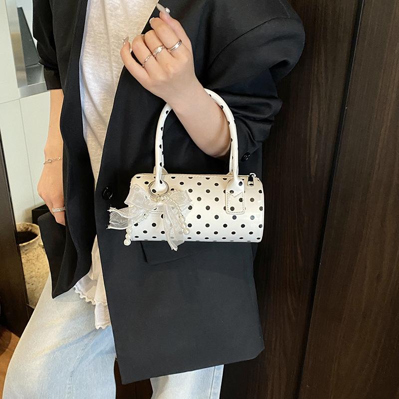 Niche design bag women's 2025 new summer shoulder messenger bag polka dot portable cylinder bag