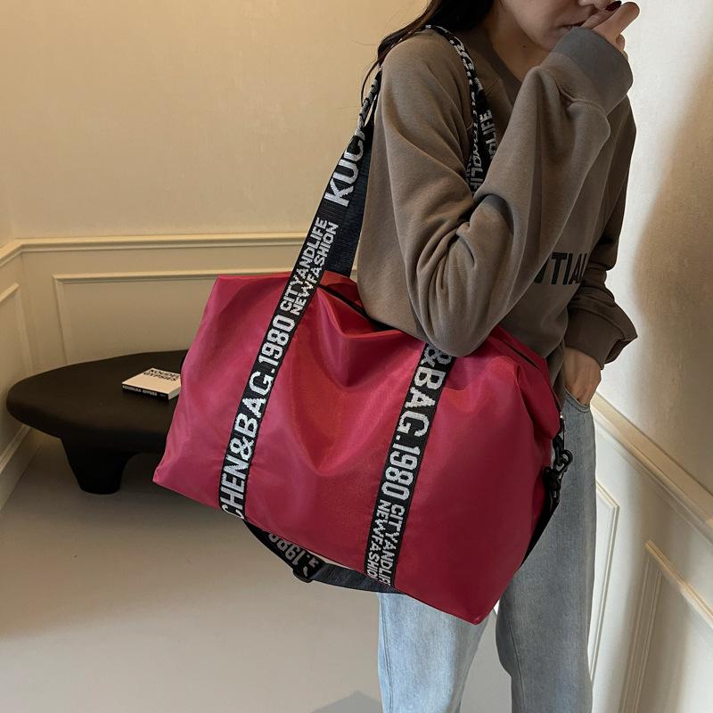 Men's and women's same fashion trend anti-splashing portable travel bag, simple and lightweight fitness bag, student school luggage bag