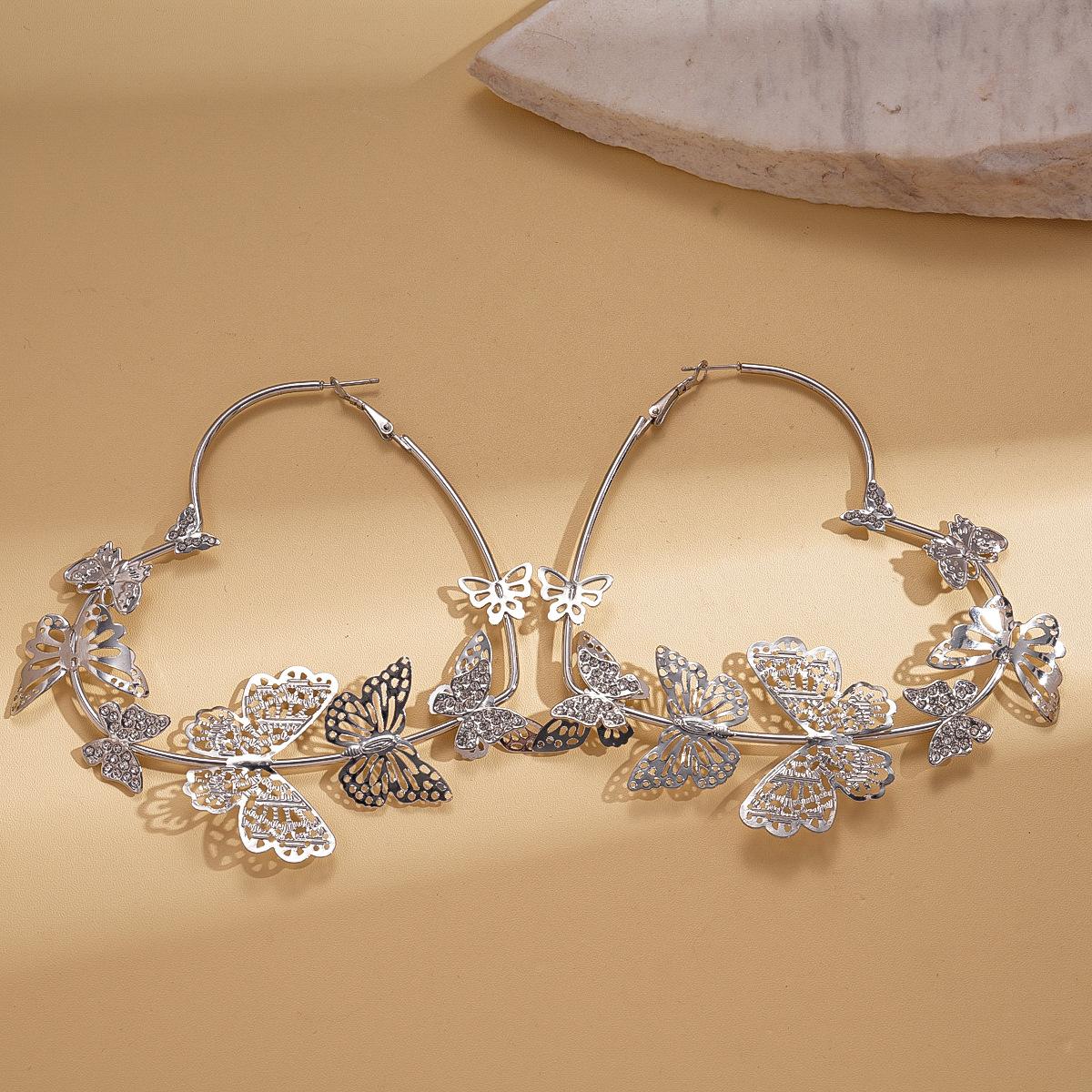 

Metal diamond-set butterfly love silver needle earrings personalized fashion light luxury earrings