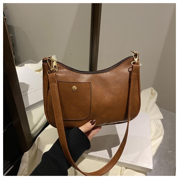 

Ретро текстура однотонный большая вместимость ранняя весна новый простой текстурный трендовый косой кроссбоди подмышечный плечевой мешок коричневый