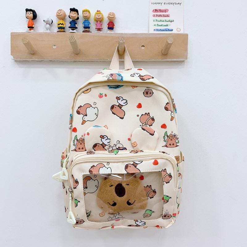 

Children s backpack New boys and girls cartoon printing casual schoolbag Large capacity baby backpack бежевий