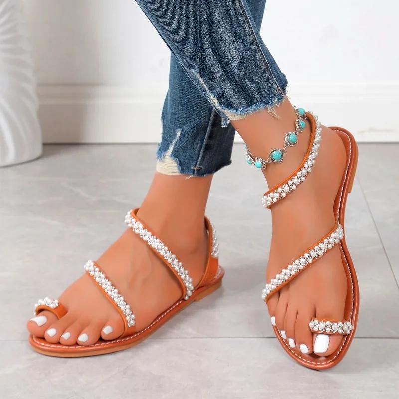 Modne buty damskie 2024 Gorąca wyprzedaż Wsuwane sandały damskie Letnie sandały z odkrytymi palcami Perły Jednolite Lekkie Outdoorowe Casualowe Płaskie Sandały w dużych rozmiarach
