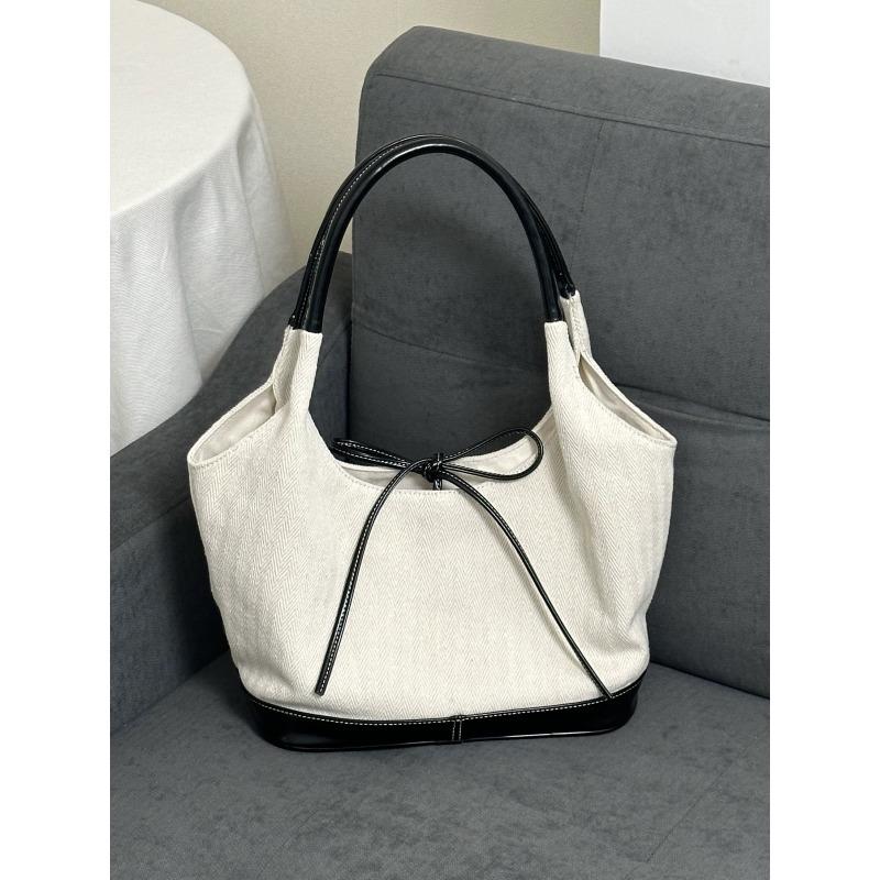 Niche Splicing Canvas Tote Bag Women's New Commuter Fashion Handbag Versatile Shoulder Armpit Bag
