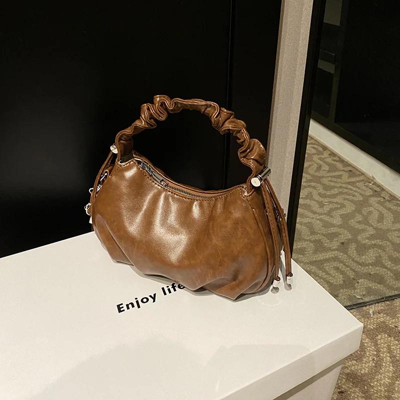 Sac bandoulière rétro niche haut de gamme automne et hiver pour femmes sac aisselle élégant et polyvalent