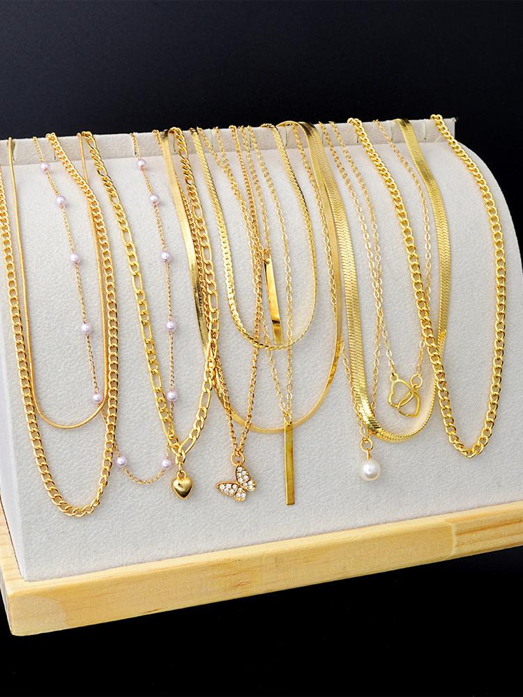 Set di 7 Collane Eleganti Boho Colore Oro per Donne Vintage Cuore Perla Zircone Multistrato Lungo Gioielli per Uso Quotidiano Nuovo