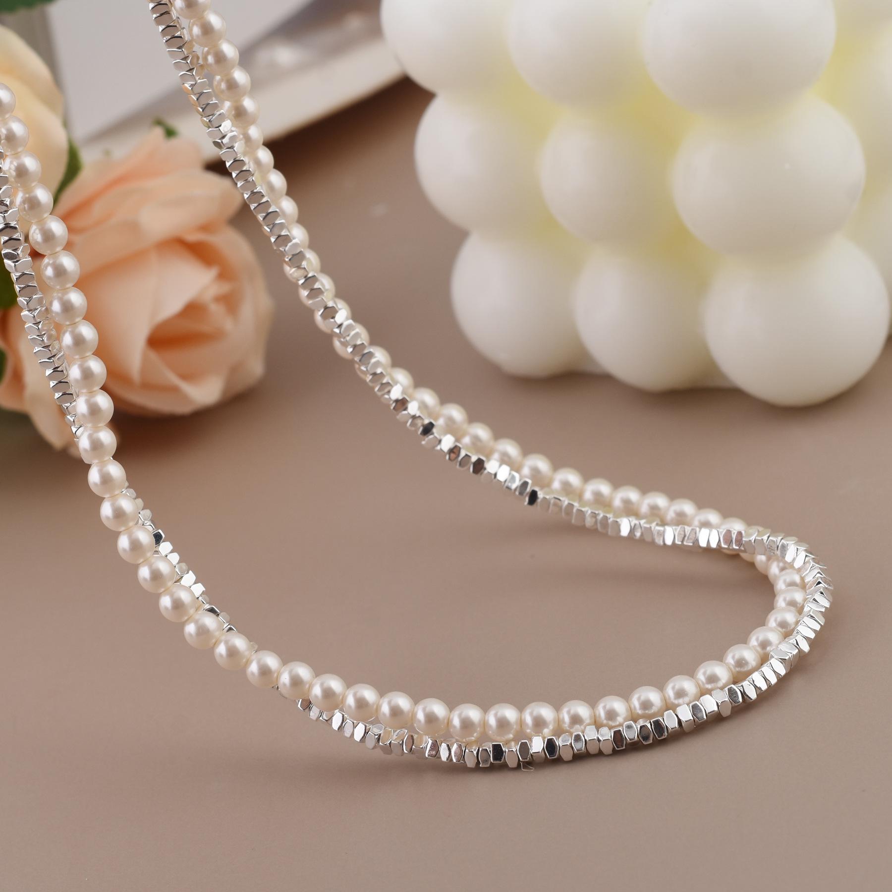 

Высококлассное двухслойное ожерелье из серебристого жемчуга - Женский роскошный чокер-аксессуар для весны/осени белый