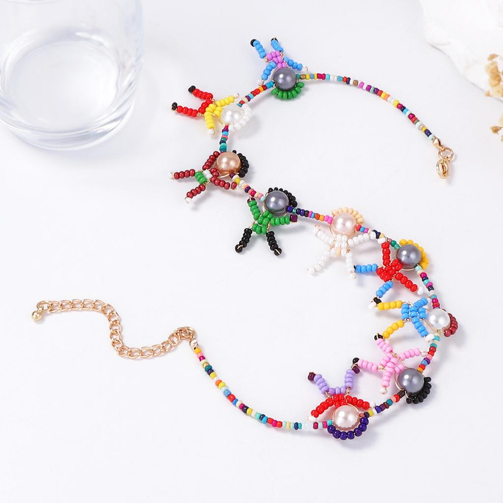 Niche Unique Creative Design Sense Hand-woven Cartoon Three-dimensional Villain Imitation Pearl Female Collarbone Chain