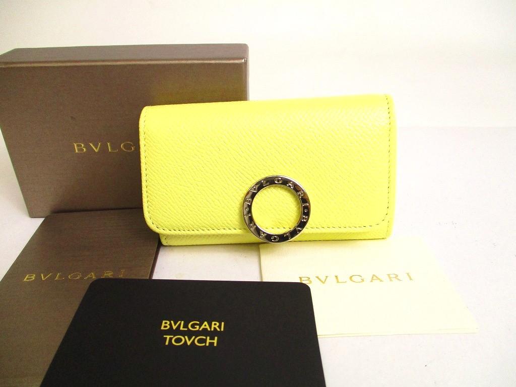 

Автентичні чохли для ключів BVLGARI зі світло-жовтим і помаранчевим логотипом із 6 фото #a144 відремонтовані