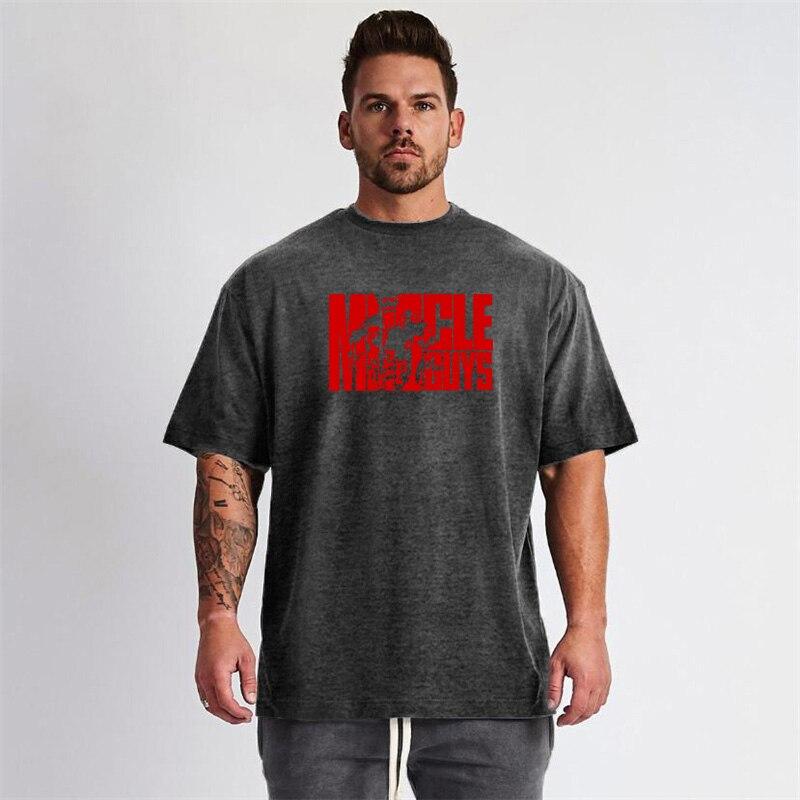 Muscleguys Men's Gym Clothes Loose Comfortable Black Short Sleeve T-Shirt Summer Bodybuilding Half Sleeve Trend Streetwear