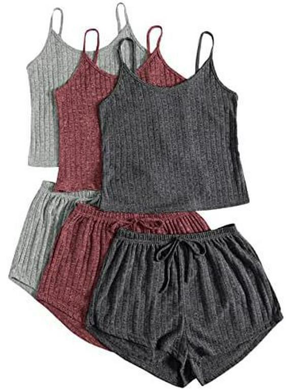 

Женский трикотажный костюм в рубчик из двух частей: Укороченный топ и шорты с высокой посадкой и завязками. Large