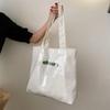 Versatile White Pvc Waterproof Tote Bag Featuring Chic Minimalist Aesthetic For Women