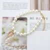 Charming Pet Collar with Emerald Pendant and Faux Pearls - Elegant Accessory for Cats and Dogs
