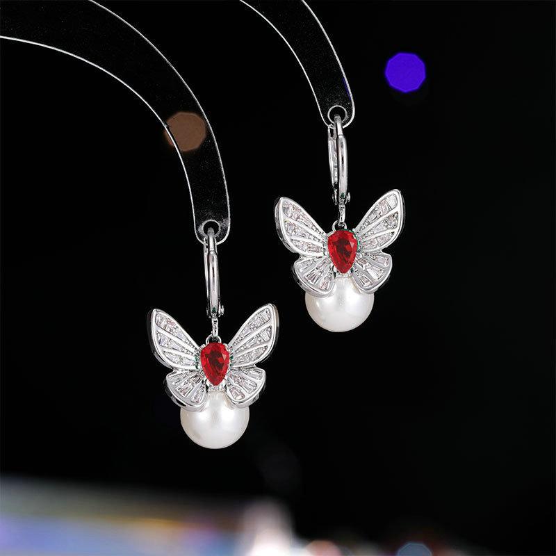 

Французская мода легкие роскошные ретро серьги слегка инкрустированные цирконием универсальные высококачественные серьги женские бабочки жемчужные серьги пряжка