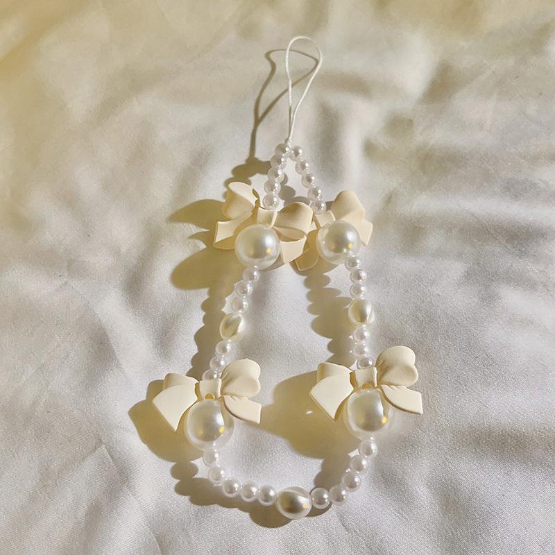 Bracelet de perles d'amour pour femmes, petit nœud en cristal frais, fleurs, amour, chaîne de téléphone portable, anti-chute, accessoires de coque de téléphone portable, DIY