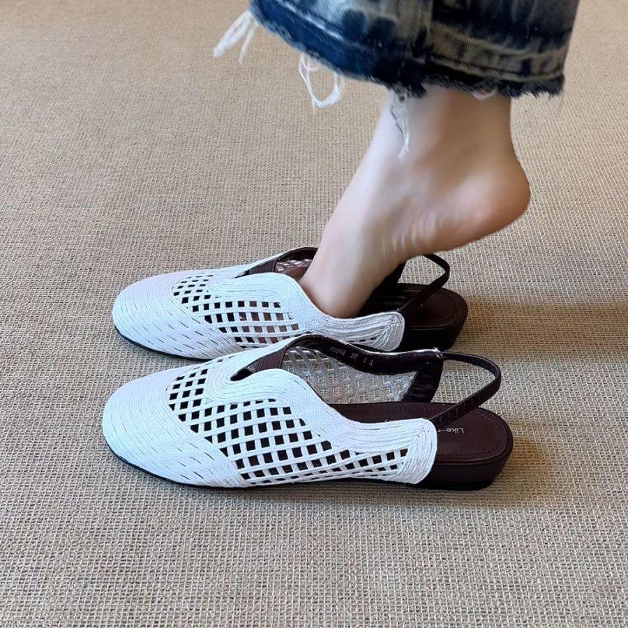 French retro design sense woven hollowed-out vacation wind slope heel lazy fashion versatile and comfortable outer bag head sandals