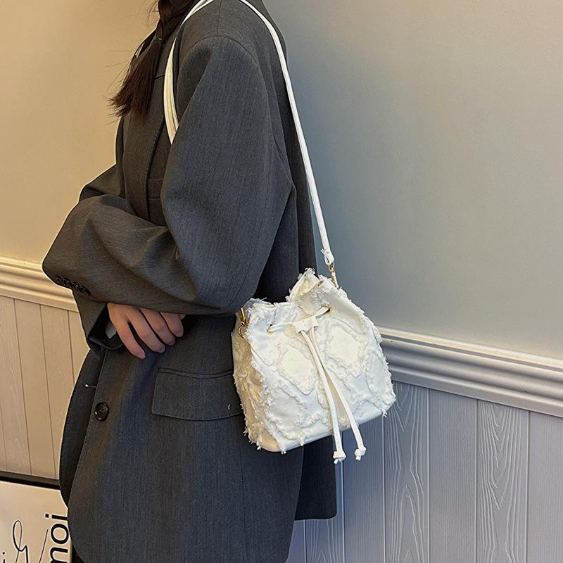 Bolsa de ombro feminina Tether Retro Design Denim Tendência Réplica Bolsa Crossbody Bolsas de balde denim de qualidade Bolsas para mulheres