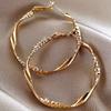 Golden Twisted Hoop Earrings, Elegant Textured Design with Sparkling Accents, Zinc Alloy & Stainless Steel Posts, Casual Party Jewelry for Women
