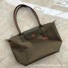 Embroidered Spliced Dumpling Tote Bag – Large Capacity Commuter Handbag