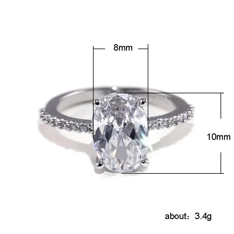 2026 Inlaid Oval Pigeon Egg Cube Zirconia Ring, Fashionable and Personalized Platinum Engagement High-quality Jewelry