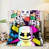 A colorful collage with smiling marshmallow faces and bold shapes. for all seasons blanket lunch break throw gift