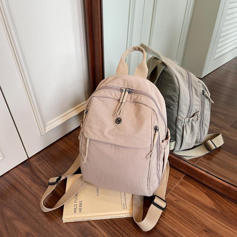 

New backpack, college student bag, casual backpack, women s simple and lightweight travel backpack хаки