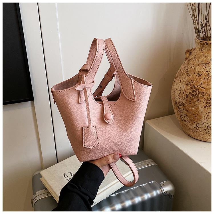 Wholesale 2025 new niche lychee pattern handbag bag women's Korean version simple bucket bag casual messenger bag