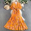 French holiday style beautiful fairy gas printing V-neck dress women's autumn and winter waist irregular elegant ruffle skirt