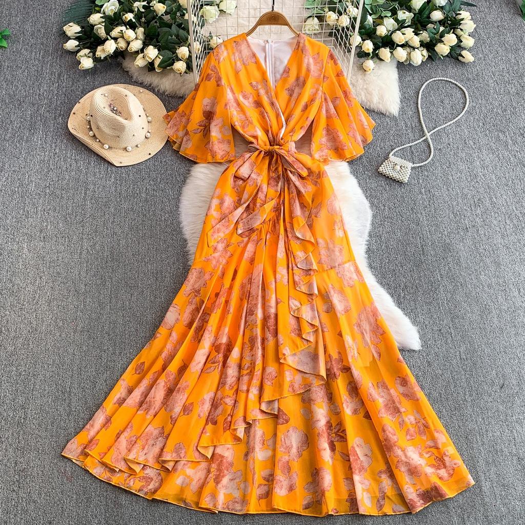 French holiday style beautiful fairy gas printing V-neck dress women's autumn and winter waist irregular elegant ruffle skirt