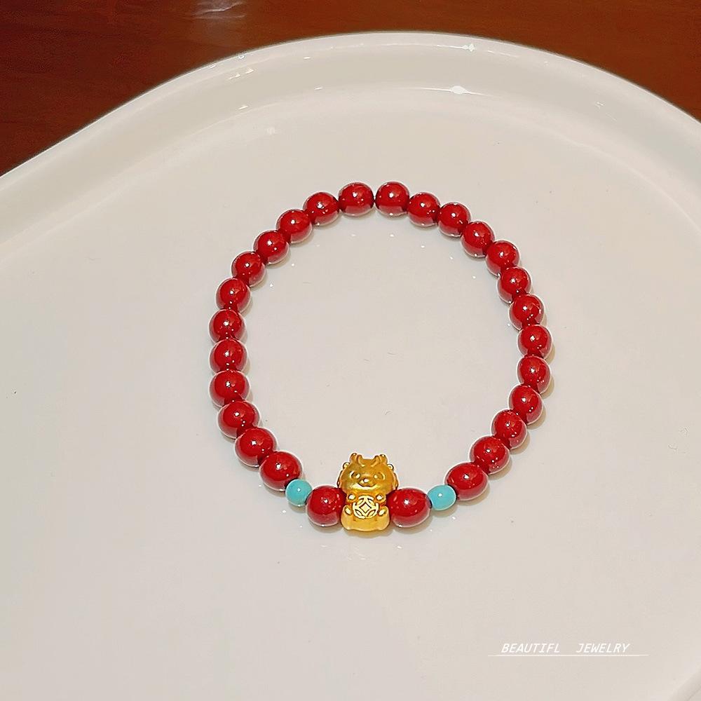 New design rock crystal elastic bracelet sweet temperament strawberry crystal bracelet jewelry girl.