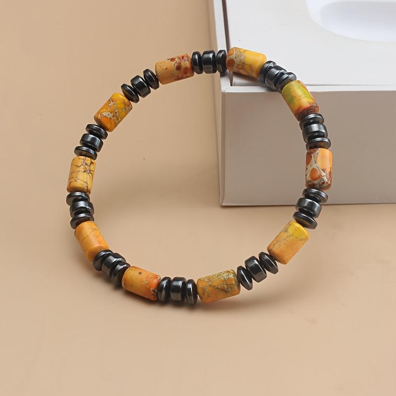 

Браслет у богемному стилі з натурального імператорського каменя та гематиту, нанизаний на еластичну мотузку ручної роботи, унісекс