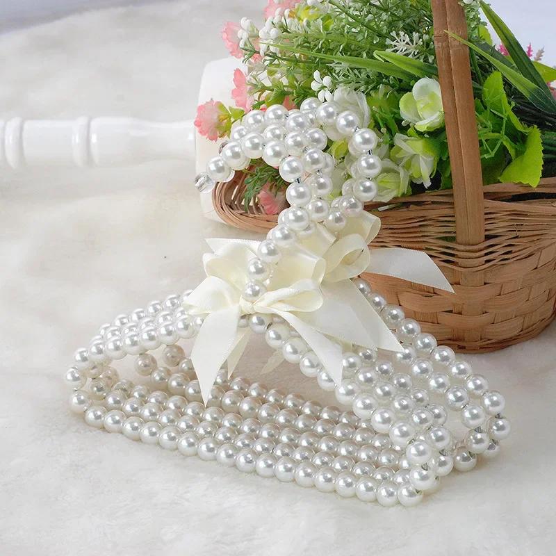 5pcs Baby Clothes Hanger Pearl Bow Rack Dog Hanger Plastic Pearl Bead Clothes Hangers Pet Cat Clothing Kid Hangers Organizer