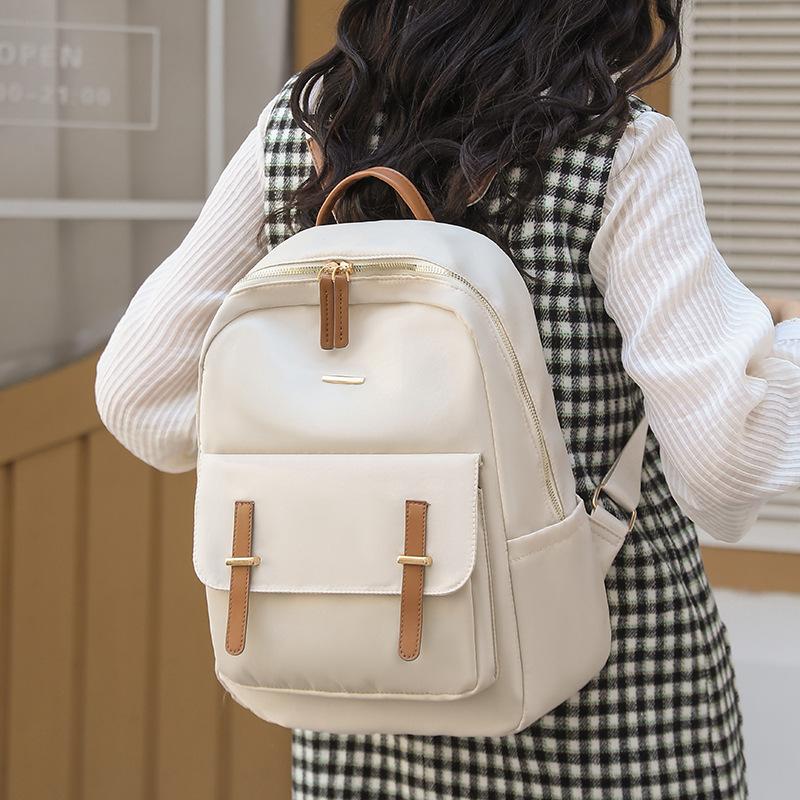 Versatile large-capacity contrasting colors women's backpacks spring new commuter travel bags student school bags women