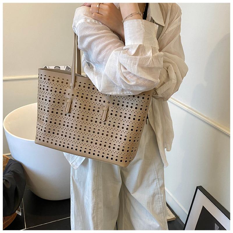 Large-capacity tote bag niche design simple hollow bag women's summer new versatile shoulder bag