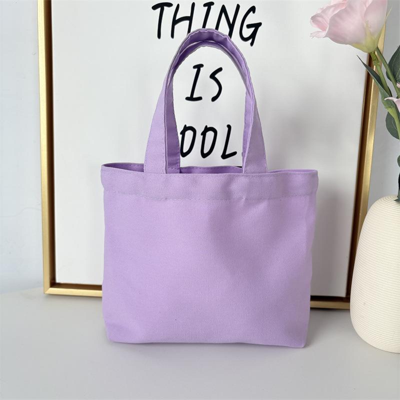Effenkleurige eenvoudige lunchtas, draagbare canvas tas, kleine stoffen tas, draagbare canvas tas voor het opbergen van diverse spullen