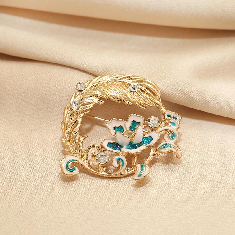 Elegante Schmetterlingsbrosche mit Perle – Damen-Modeschmuck-Anstecknadel von hoher Qualität