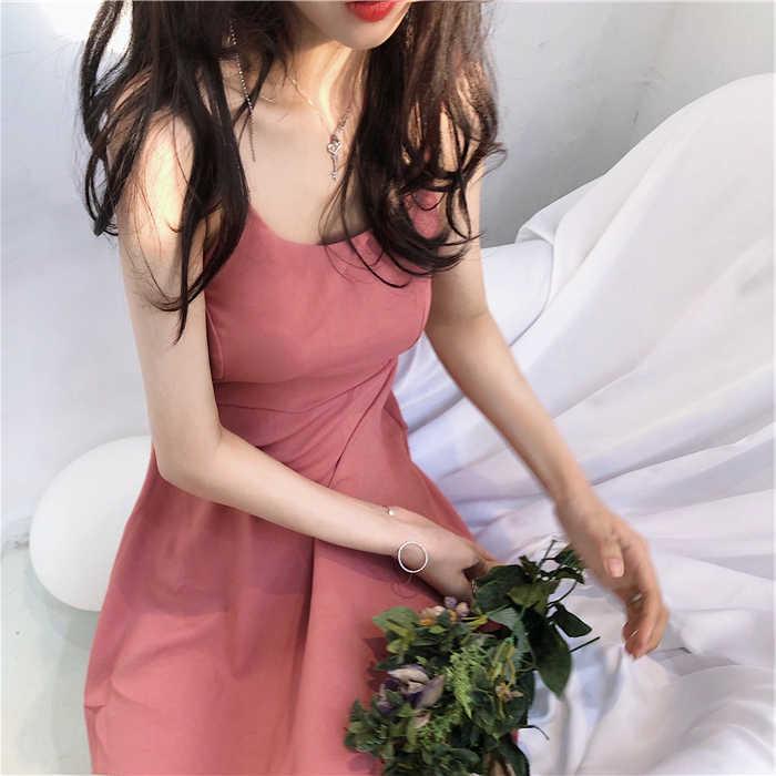 Lös sommarklänning i maxilängd i japansk stil - Fransk mode design med öppen rygg