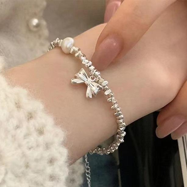 

Новый нишевый изысканный сломанный серебряный бант жемчужный браслет женский летний простой легкий роскошный ювелирный продукт высокого класса copper