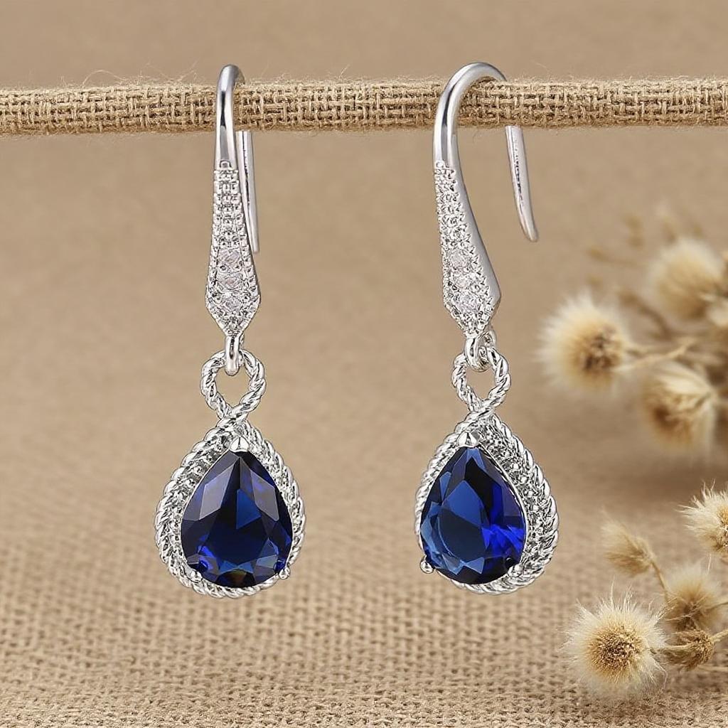 A pair of luxurious geometric elegant teardrop shaped female earrings, wedding engagement party jewelry accessories