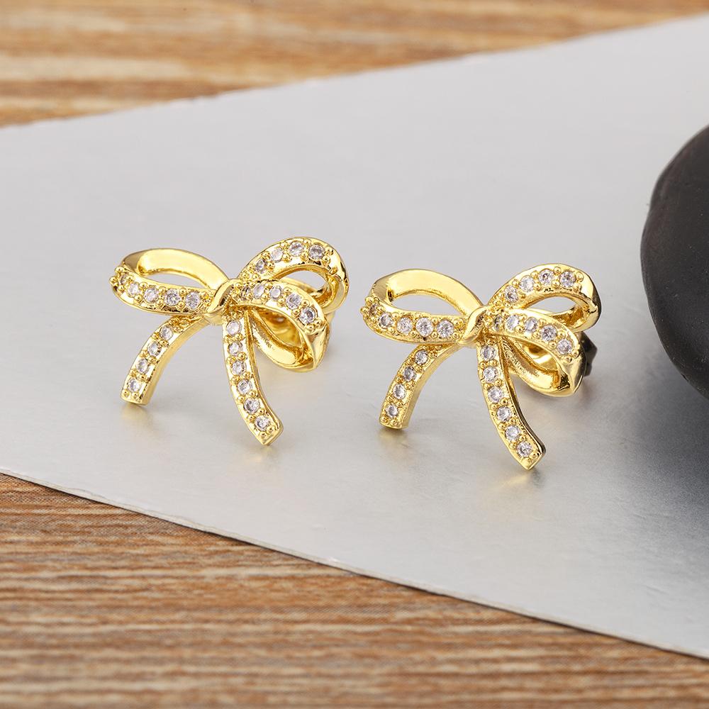 

Nidin New Retro Bow Shape Fashion Cute Charm Stud Earrings For Women Inlaid Shiny Crystal Zircon Ear Jewelry Daily Party Gifts золотой