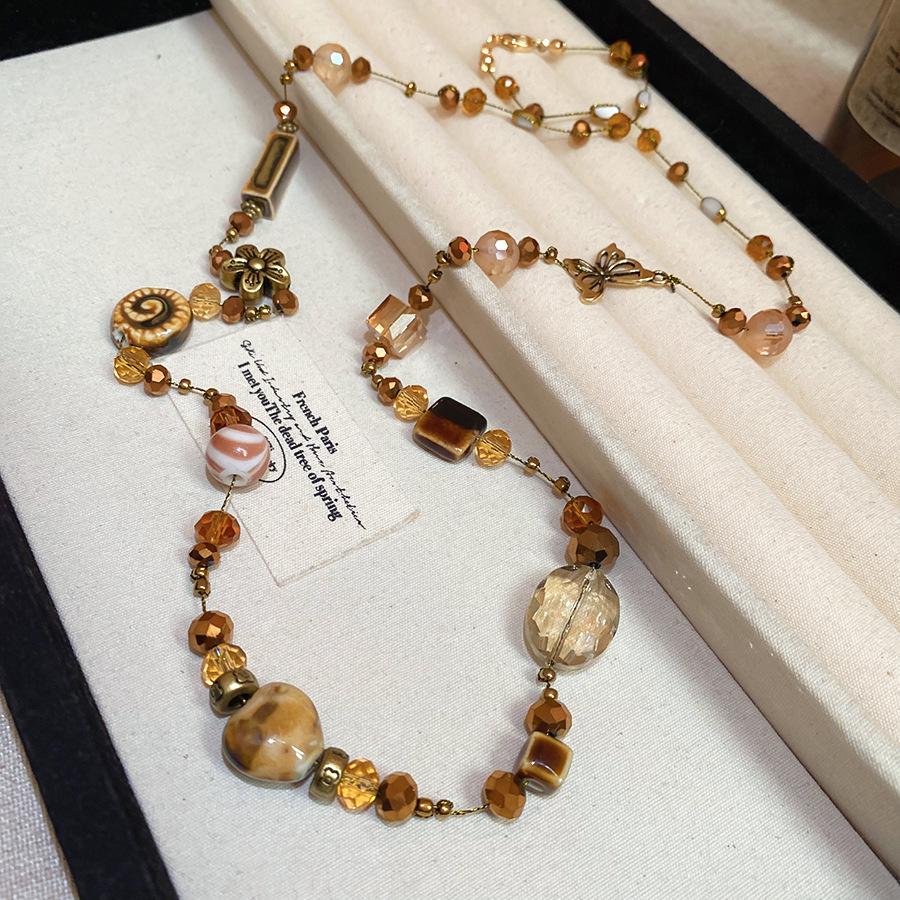 Titanium Steel Sun Necklace with Natural Stone Rice Beads - Retro Ethnic Clavicle Chain, Light Luxury Fashion Accessory