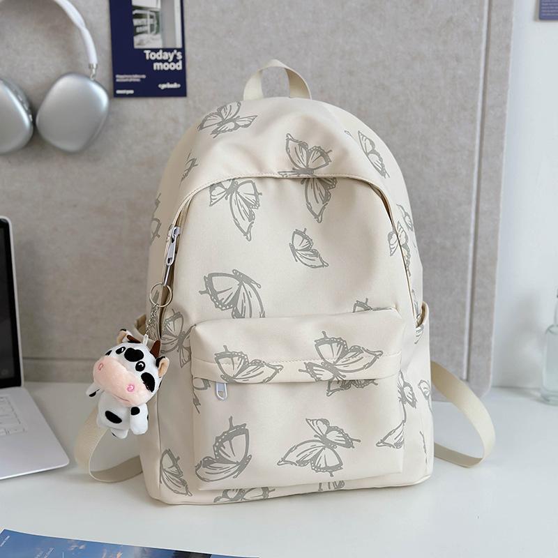 High-value reflective butterfly backpack, new junior high school girl high school student schoolbag ins niche travel backpack