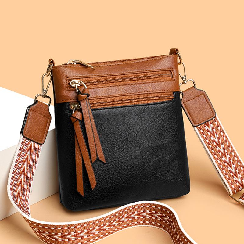 Vertikale Umhänge-Crossbody-Tasche mit mehreren Fächern und breitem Riemen