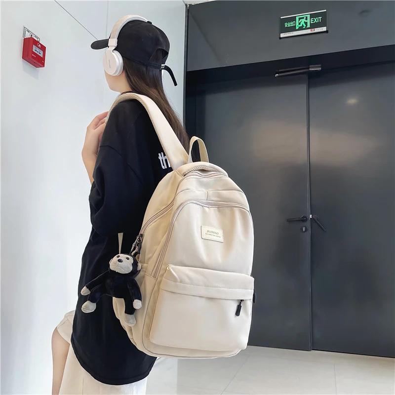 Sac à dos femme couleur unie femme multi-poches décontracté homme sac de voyage cartable de haute qualité pour adolescente livre sac à dos