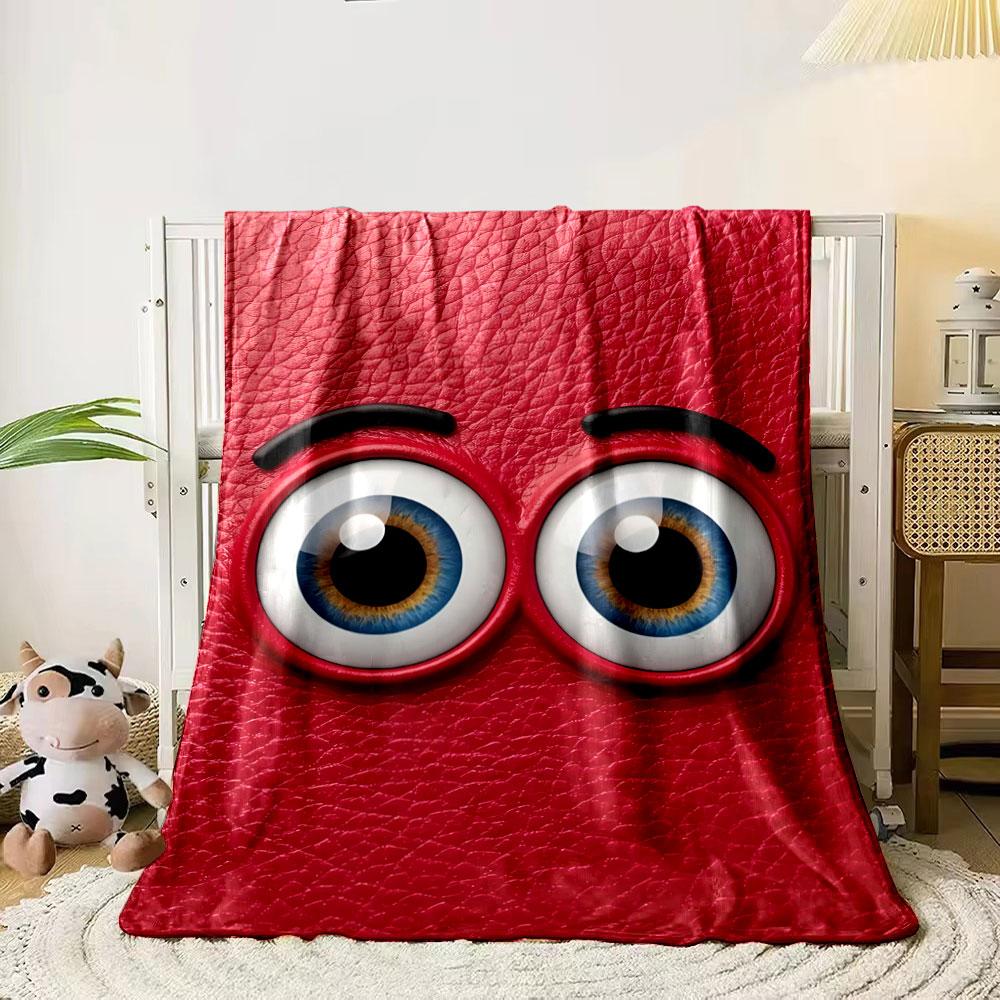 

Blue cartoonish eyes on a textured red leather-like background. for all seasons blanket lunch break throw gift 80cm x 120cm