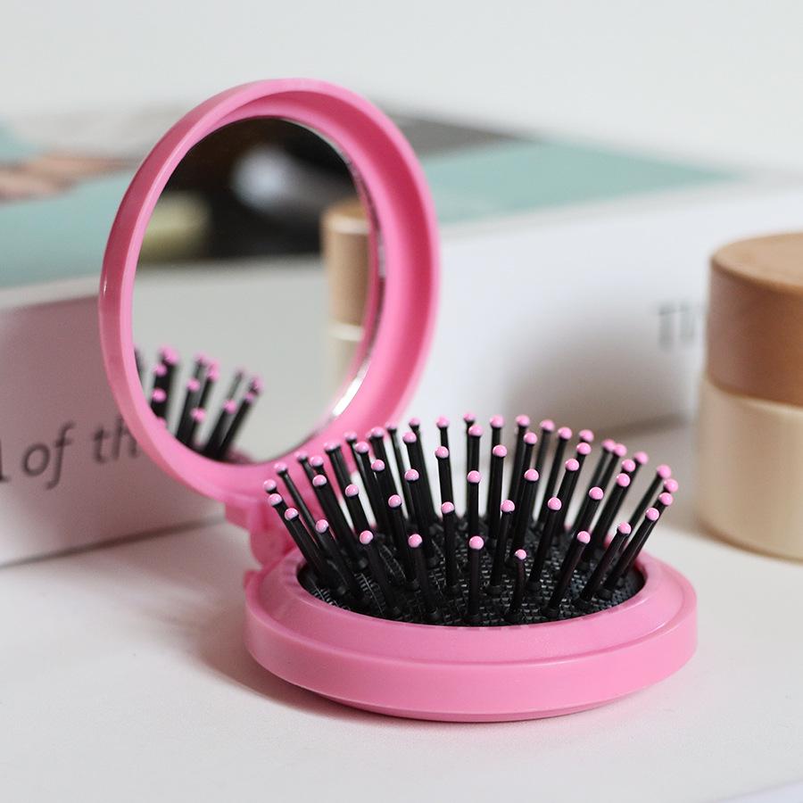 Kompakter Klappkamm & Schminkspiegel mit Airbag-Polster für Kopfmassage
